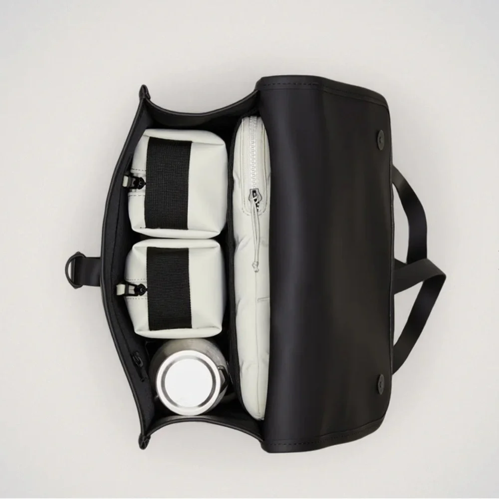 NWT Rains waterproof backpack in black